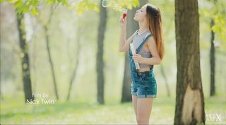 angelic cutie playing with