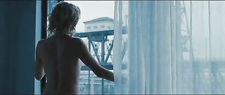 blonde lady opens window