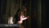 Naked teen struggles as she tries to get out of the cage.
