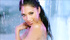Sweet looking Latina loves singing on music video while having a shower.