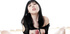 Hot Asian in slutty outfit posing before giving handjob