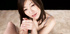 Japanese in white night gown pleasing guy with hands