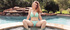 Cute busty teen demonstrates her fine boobs near the pool
