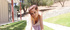 Petite cute teen enjoys dancing outdoors showing butt and cleavage