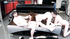 Redhead hussy provides two hunks with sexual pleasure in a threesome