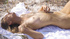 Natural blonde does outdoor striptease at a beach