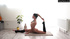 Short-haired brunette stretching wearing nothing at all