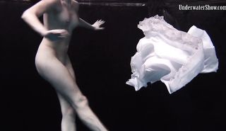 big tits brunette swimming