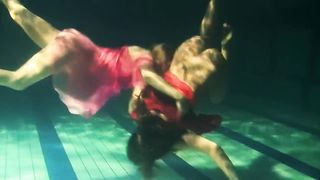 big tits brunette swimming