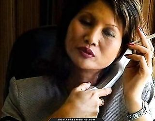 mature asian businesswoman black