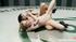 Petite ponytailed fighter jumping on her brunette rival's strap-on after having been defeated