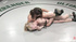 Ponytailed blonde wrestler with numerous tattoos fighting furiously with her rival not to be fucked
