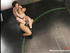 Inked brunette fucks her exotic opponent in the ring