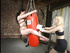 Big boobed dark haired slave gets dominated by a blonde babe