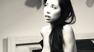 black haired asian slowly