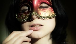 brunette hottie puts mask